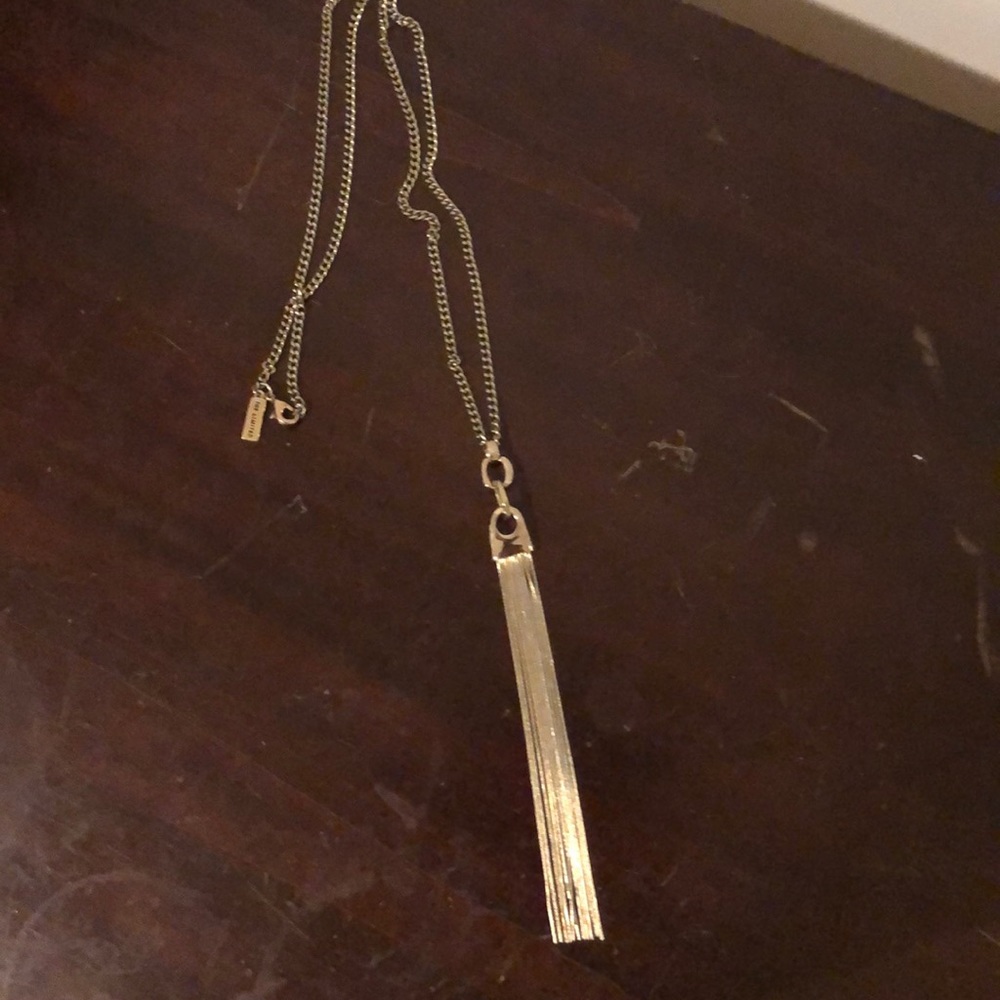 Long gold necklace